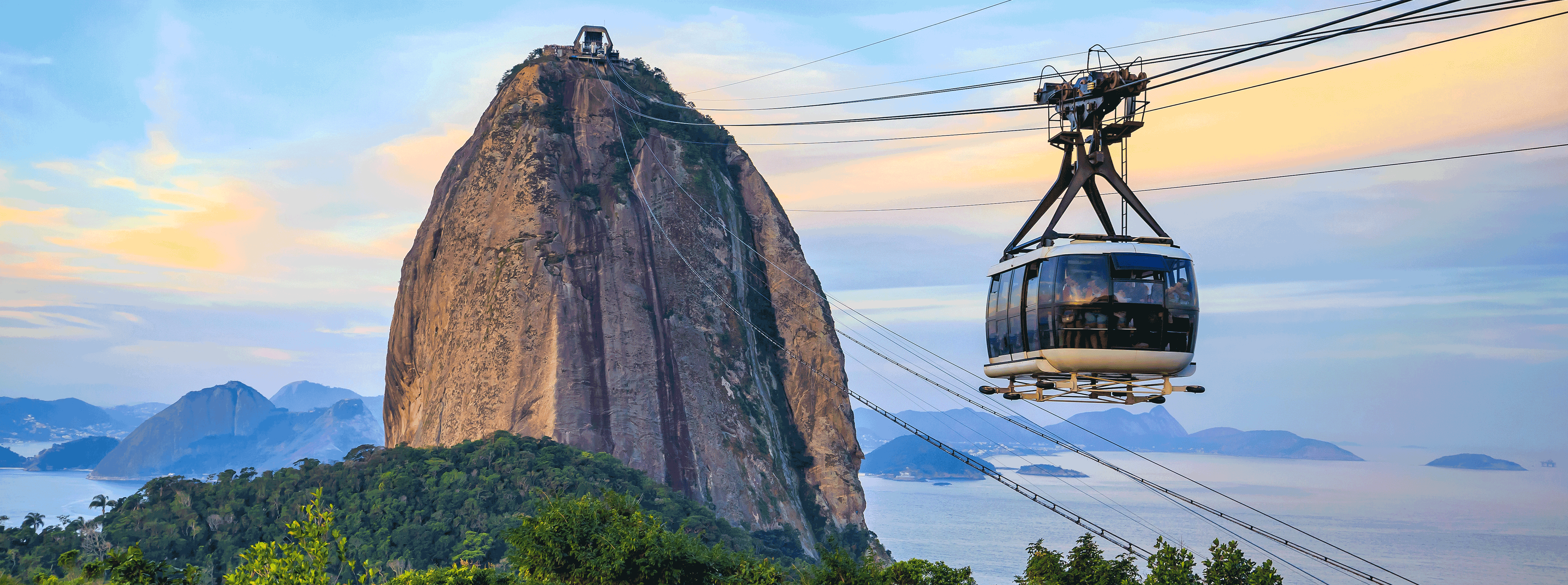 /resource/Images/southamerica/brazil/headerimage/Cable-car-and-Sugar-Loaf-mountain-in-Rio-de-Janeiro.png